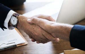 Formal greetings — businesspeople shaking hands