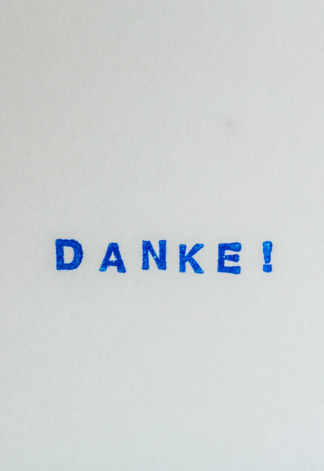 "Danke!" ("thank you" in German) writter in bold letters in pen